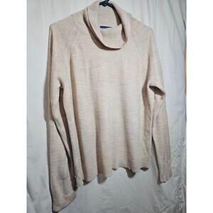 Kendra Scott XL Tan turtleneck.